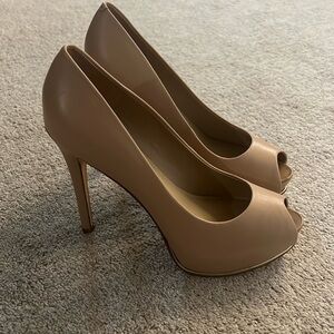 Guess tan heels. Size 8.